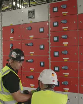 Engineers at the switchgear
